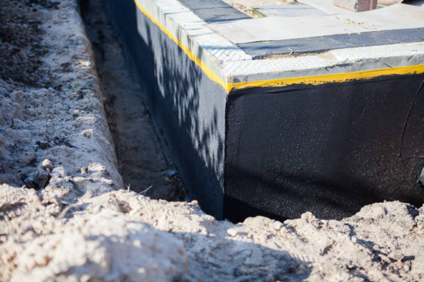 Professional Waterproofing technician working in Fort Wayne, IN